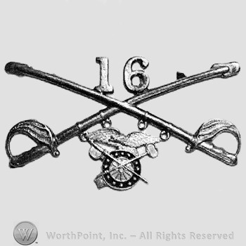 Insignia consisted of crossed sabres, number 16 above and winged wheel below.