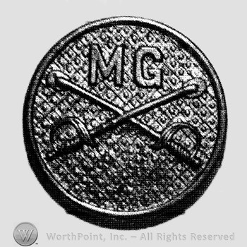 Insignia consisted of collar disc with crossed sabres on and letters MG above.