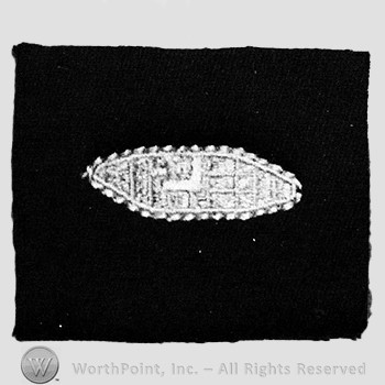 Insignia consisted of embroidered tank.
