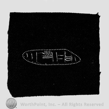 Insignia consisted of embroidered tank.