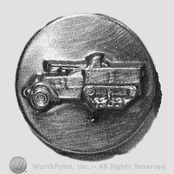 Insignia consisted of a disc with a shape like a tank on.