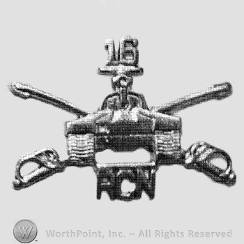 Insignia consisted of crossed sabres, front view of a tank and letters ACN; number 116.