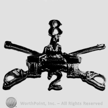 Insignia consisted of crossed sabres, front view of a tank and number 8 above and number 2 below.