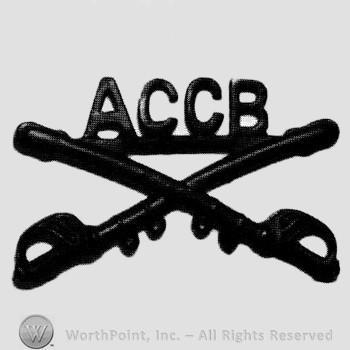 Insignia consisted of crossed sabres and letters ACCB above.