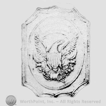 Insignia consisted of a plate with an eagle over crossed cannon and drum.
