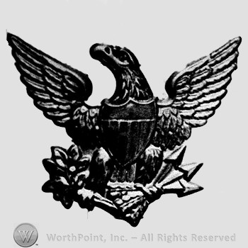Insignia consisted of an eagle with opened wings, shield, branch of olive leaves and arrows in its claws.