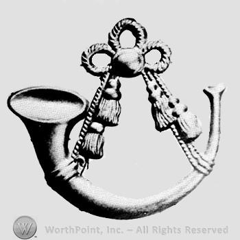Insignia consisted of an open horn suspended by four twisted cords and tassels.