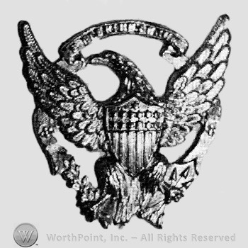Insignia consisted of an eagle with shield over a branch.