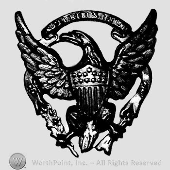 Insignia consisted of an eagle with shield over a branch.