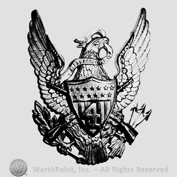 Insignia consisted of eagle gold-plated, with detachable shield and rifles worn with regimental number in silver on the shield; arrows and branch in the claws of the eagle and a ribbon in the beak; number 4 on the shield.