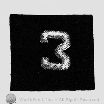 Insignia consisted of embroidered number 3.