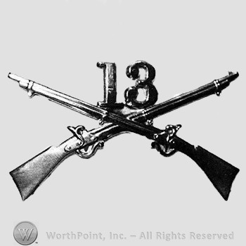 Insignia consisted of crossed rifles, number 13 above the intersection.