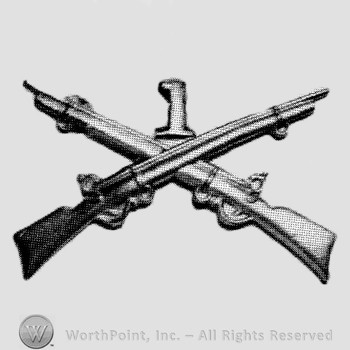 Insignia consisted of crossed rifles, number 1 above the intersection.
