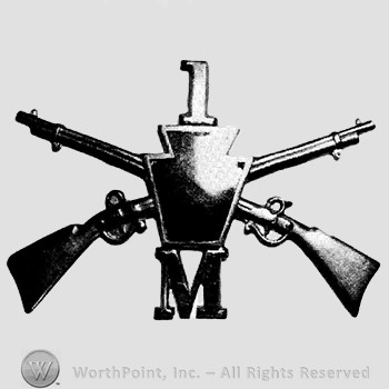 Insignia consisted of crossed riffles, shield, number 1 above and letter M below.