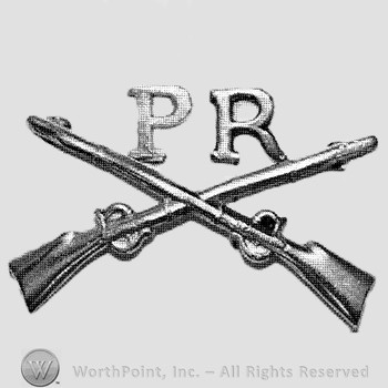 Insignia consisted of crossed rifles and letters PR above the intersection.