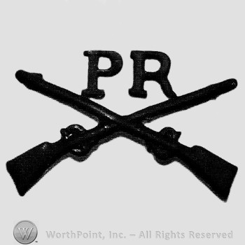Insignia consisted of crossed rifles and letters PR above the intersection.