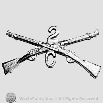Insignia consisted of crossed rifles, number 2 above the intersection and leter C below.