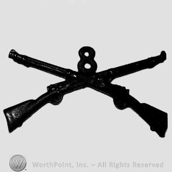 Insignia consisted of crossed rifles, number 8 above the intersection.