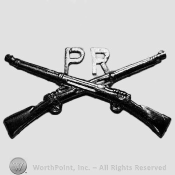 Insignia consisted of crossed rifles, letters PR above the intersection.