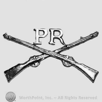 Insignia consisted of crossed rifles and letters PR above the intersection.