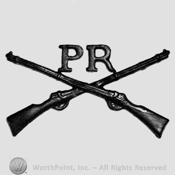 Insignia consisted of crossed rifles and letters PR above the intersection.