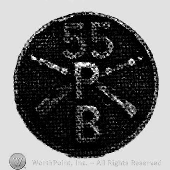 Insignia consisted of crossed rifles, letter P in the center, letter B below  and number 55 above; all on a disc.
