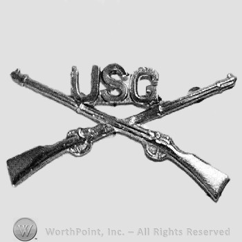 Insignia consisted of crossed rifles and letters USG above the intersection.