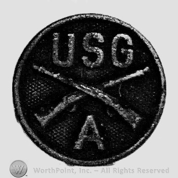 Insignia consisted of crossed rifles, letters USG above the intersection and letter A below; all on a disc.