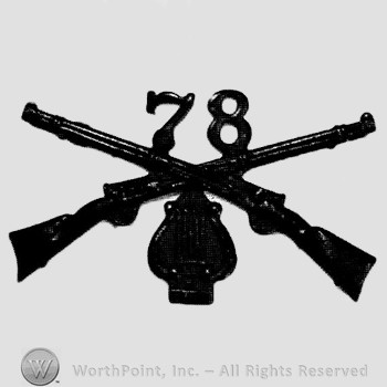 Insignia consisted of crossed rifles, number 78 above the intersection and a lyre below.