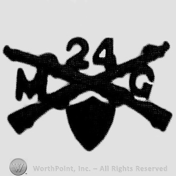 Insignia consisted of crossed rifles, number 24 above the intersection, a shield below and letters MG on the left and right.