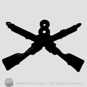 Insignia consisted of crossed rifles and number 8 above the intersection.