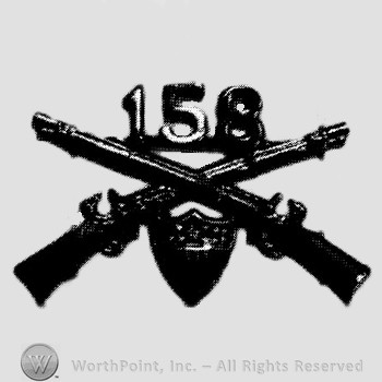 Insignia consisted of crossed rifles and number 158 above the intersection; shield below.