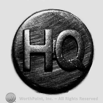Insignia consisted of letters HQ on a disc.