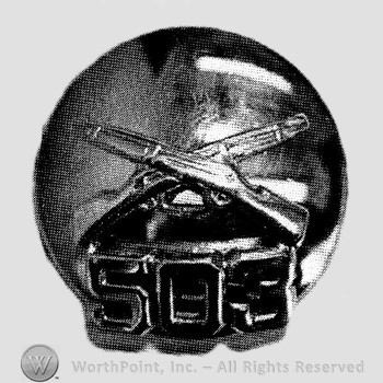 Insignia consisted of crossed rifles and number 503 below the intersection; all on a disc.