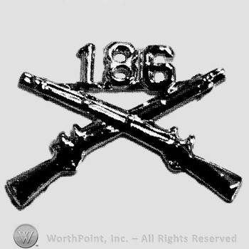 Insignia consisted of crossed rifles and number 186 above the intersection.