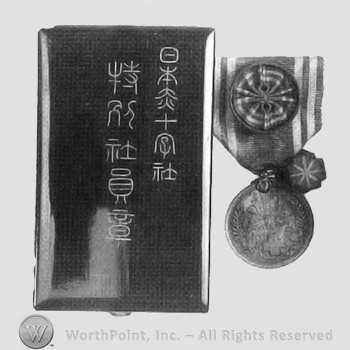 Boxed red cross medal.