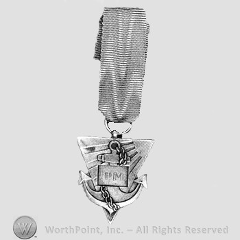 Manchuko puppet state naval merit medal; anchor over a triangle and letters PM.