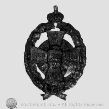 Oval wreath encompassing patee cross dated 1769 & 1868 on west & east arms; crown at top.