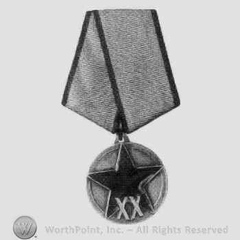 Medal like a star over a plate; on hard mtd bi-fold ribbon.