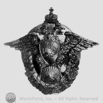 Odessa Military school badge; silvered metal imperial eagle Russian alphabet equivalent of O.M.S across bottom in copper shield on eagles chest & cooper sunburst below.