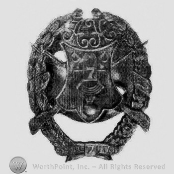 Wreath around shield & crossed rifles; 1909 date on wreath in 2 places.