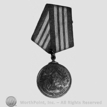 Soviet Nakhimov medal numbered: brass pendant profile of Nakhimov & image of sailing ship on back.