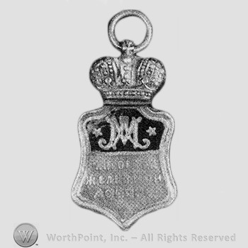 Shape like a shield and crown above; russian letters.