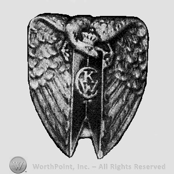 Crowned eagle above a ribbon containing letters CKW.