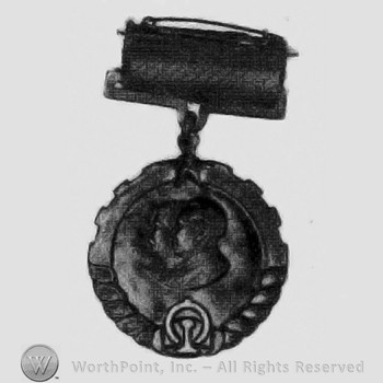 Busts of two men on a medal.