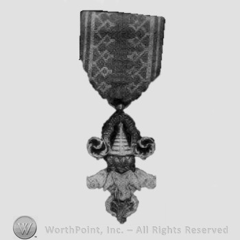 Enamel badge ornate pagoda suspension; elephants design.