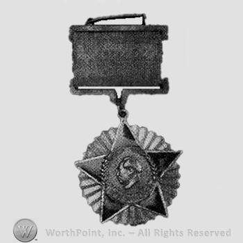 A man's head over a star; medal.