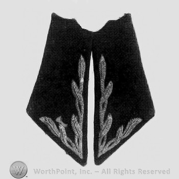 Collar tabs.