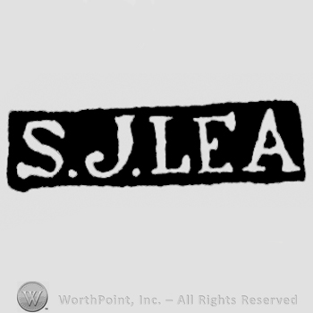 The name S.J. Lea written with uppercase letters
