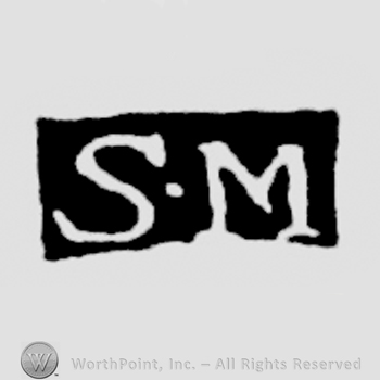 The letters SM written in uppercase